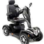 Cobra Gt4 outdoor heavy duty power scooter- color black - padded armrest - captain seat with a head rest - fully assembled - full front image - PUREUPS 