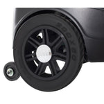 close up image of the rear wheel and the anti tip wheel in the back of the spitfire scout three wheel mobility scooter - color black - PUREUPS 